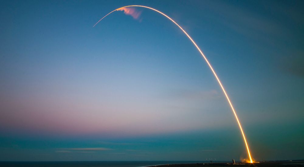 image of a rocket creating an arc